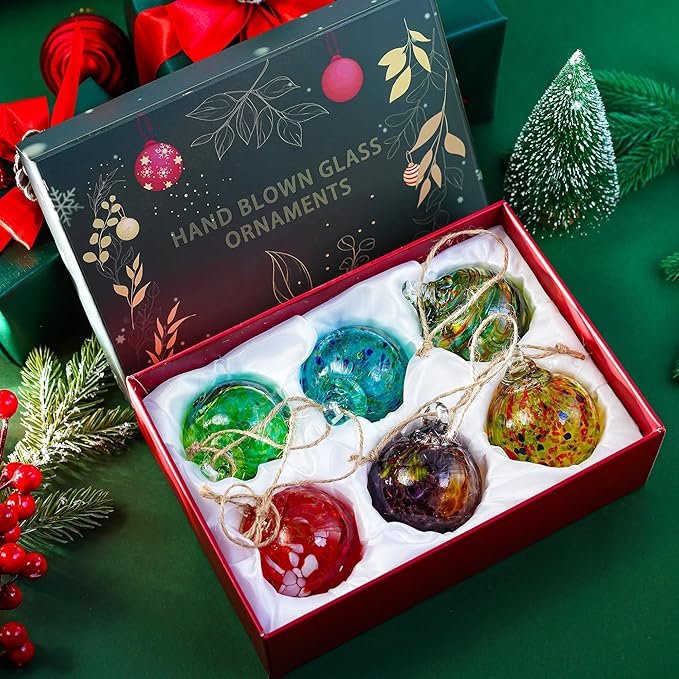 Hand-blown glass Christmas tree ornament with intricate designs