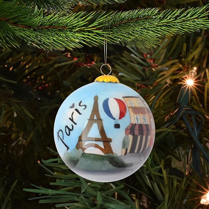 A set of hand-painted Christmas ornaments with festive designs